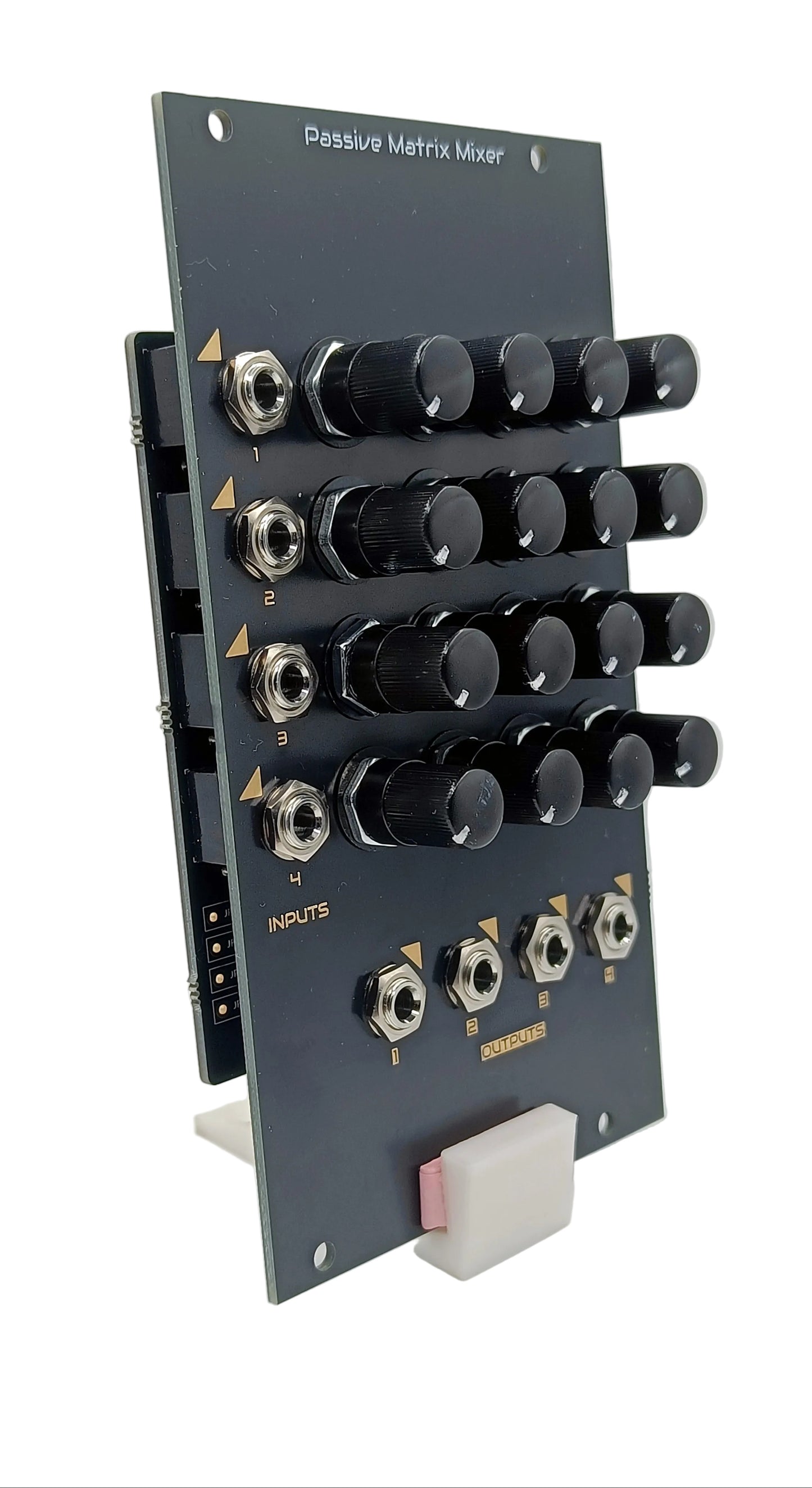 Electronic module with knobs and connectors on a stand against a white background